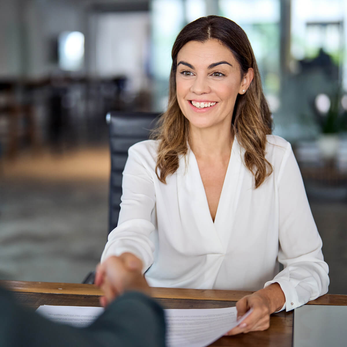 Female Insurance Agent Shaking Hands